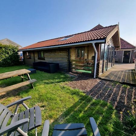 Finse Woning Op Camping De Tulpenweide Breezand Exterior photo